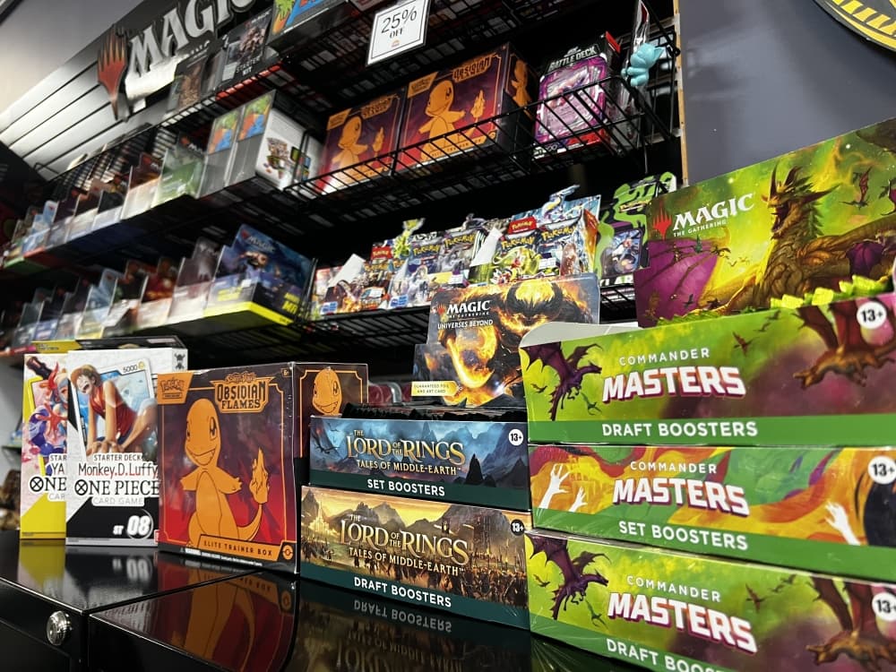 several boxes with different card game varieties 