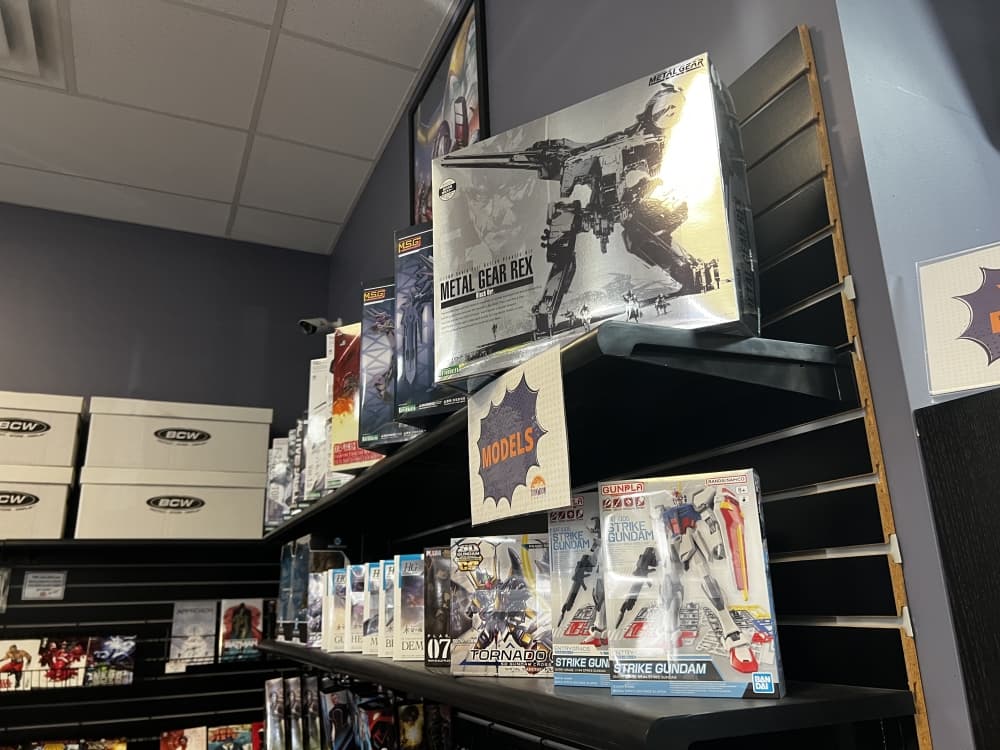 figures on display on wall shelves 