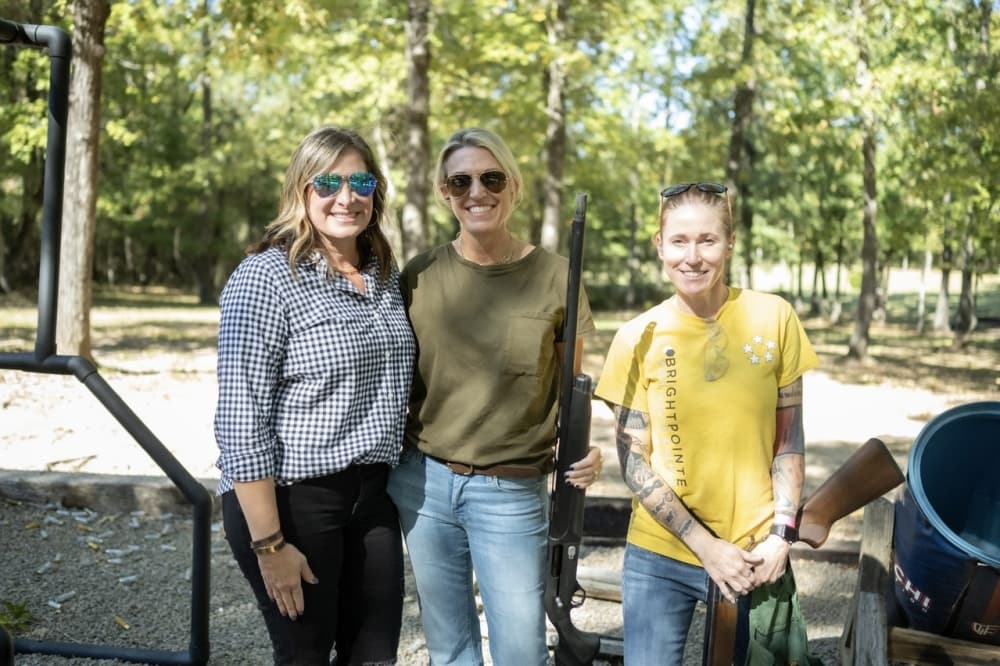 Women posing at event