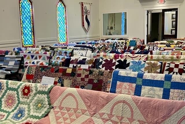 Quilts displayed in the Old Methodist Church