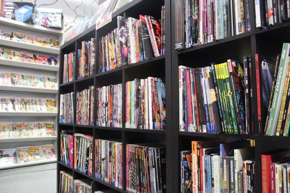 Trade paperback comic books on a shelf