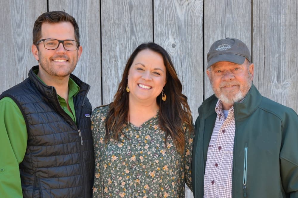 Jarratt and Rebecca Calvert with her father, Jeff McCauley.