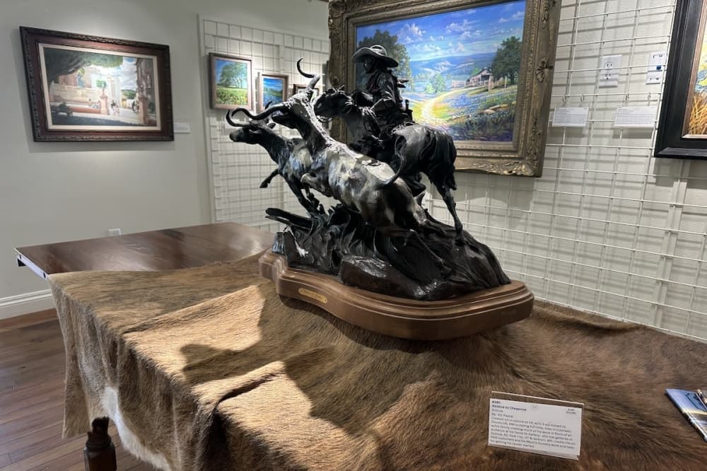'Abilene to Cheyenne' is a bronze sculpture made by New Mexico sculpture Vic Payne.(Amira Van Leeuwen/Community Impact)