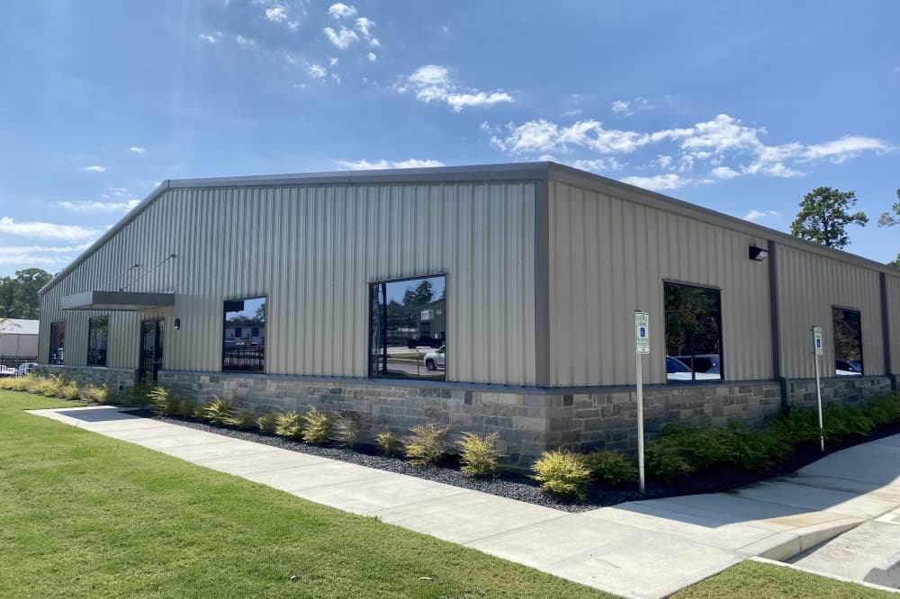 The exterior of a tan building