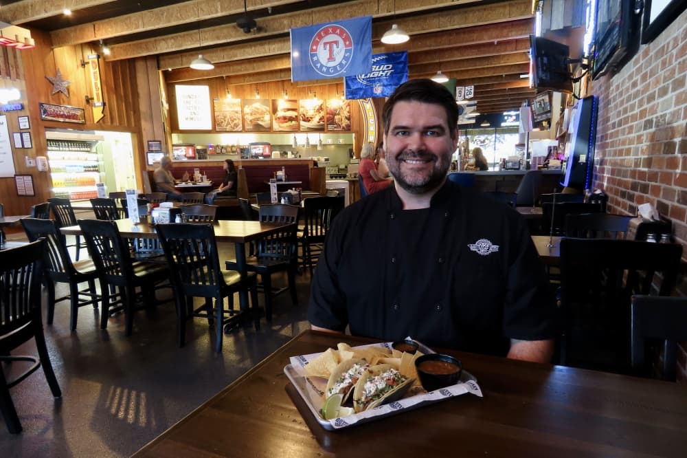 Lee Marshall posed at Bottlecap Alley Icehouse Grill 