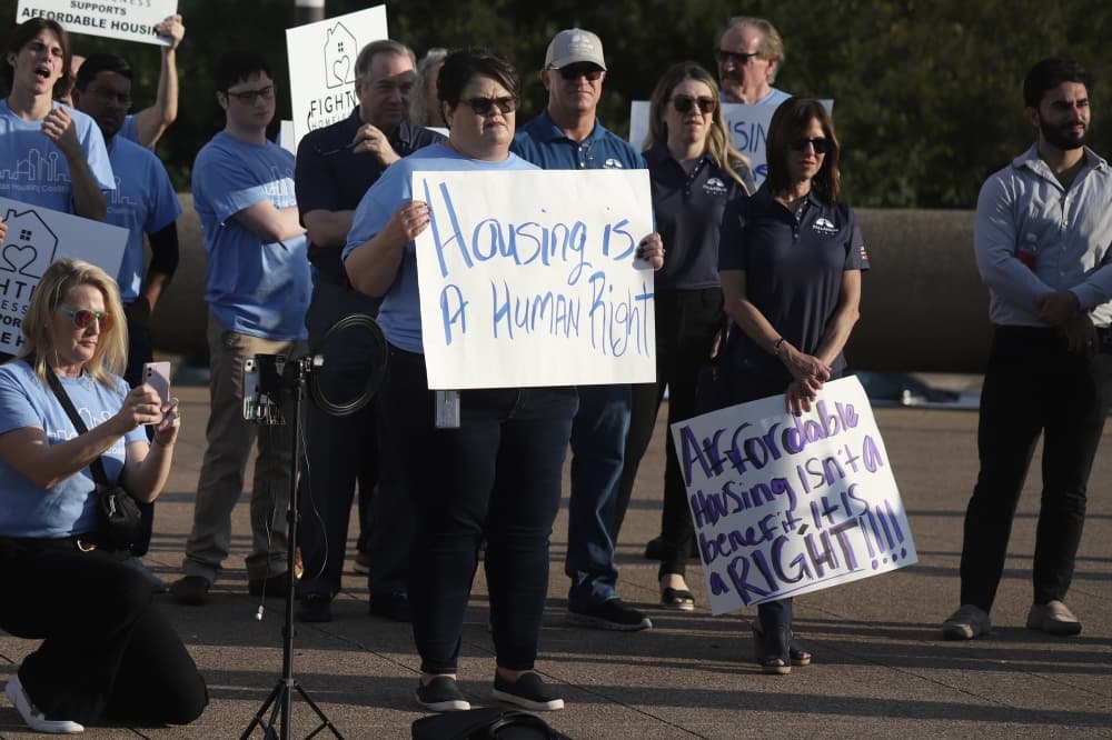 People holding signs