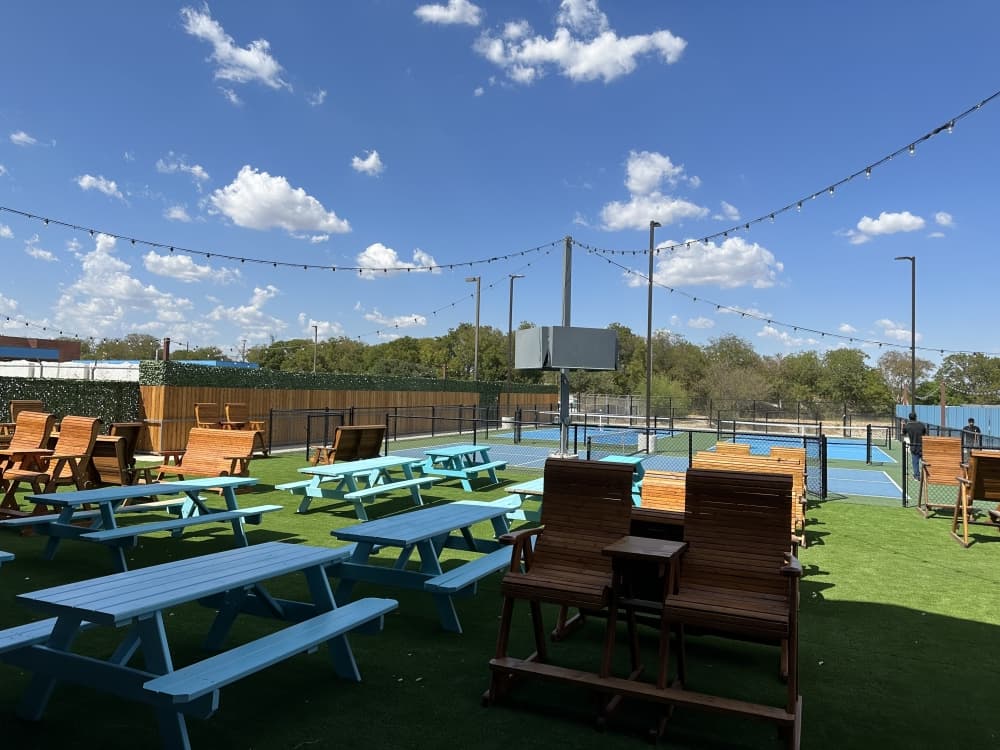outdoor benches and pickleball court