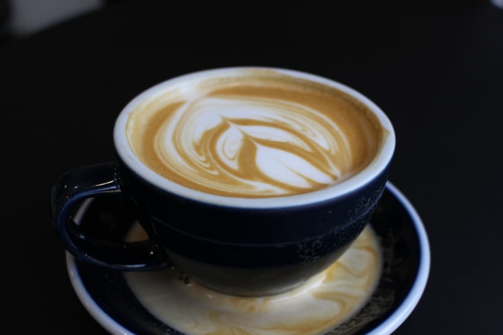 Latte inside blue cup
