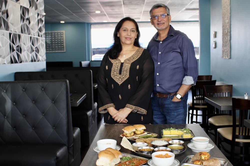 Jitu and Hema Chudasama, Khau Gully restaurant owners in front of dishes at restaurant 
