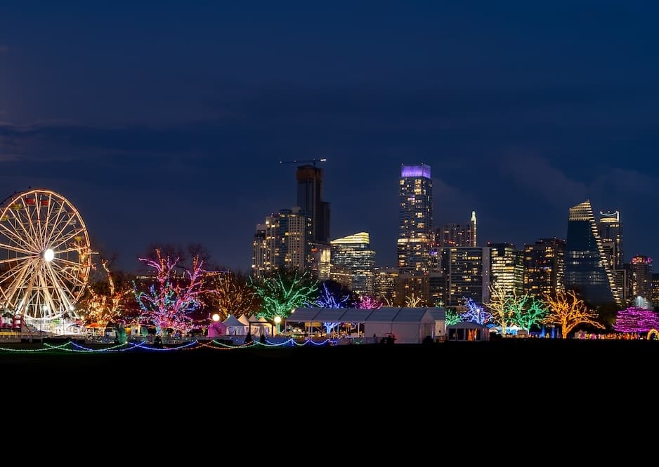 View of complete Austin Trail of Lights display in front of downtown skyline