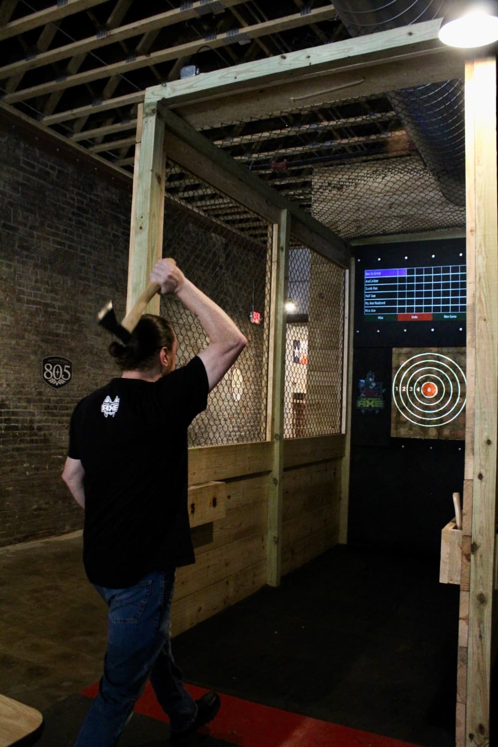 Owner Andrew Duncan demonstrates ax throwing