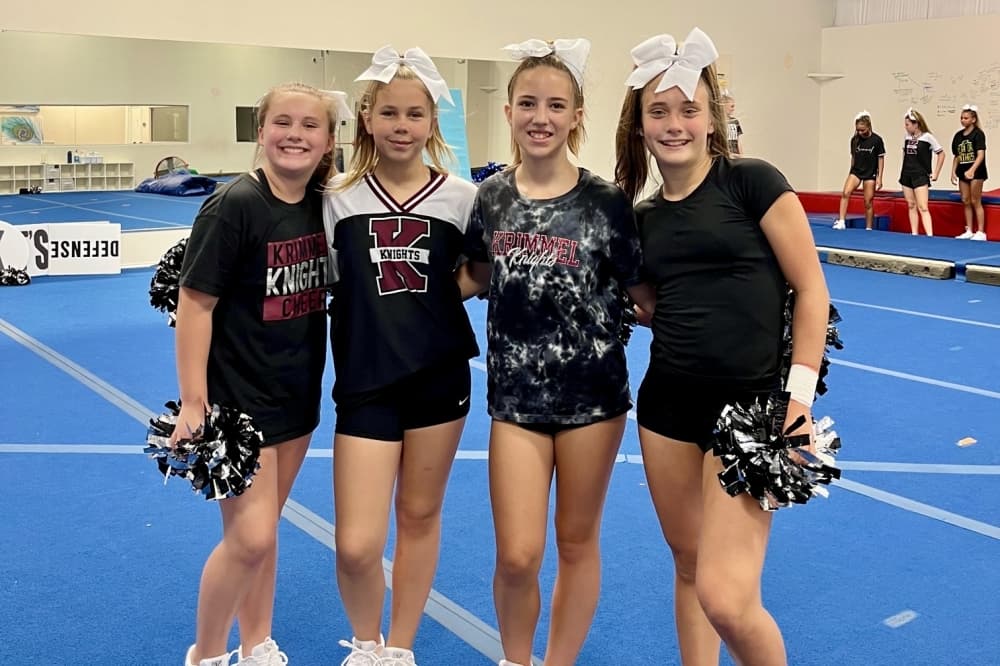 Four cheerleaders