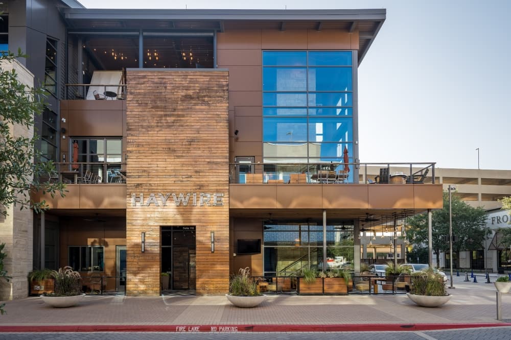 two story building with wood facade 