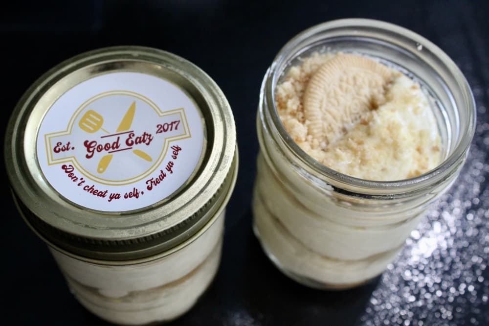 banana pudding in mason jar with Good Eatz logo on top