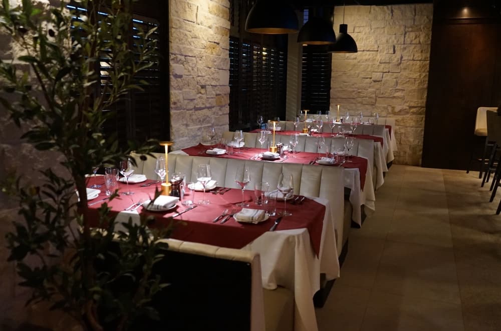 Interior of a restaurant with set dining places
