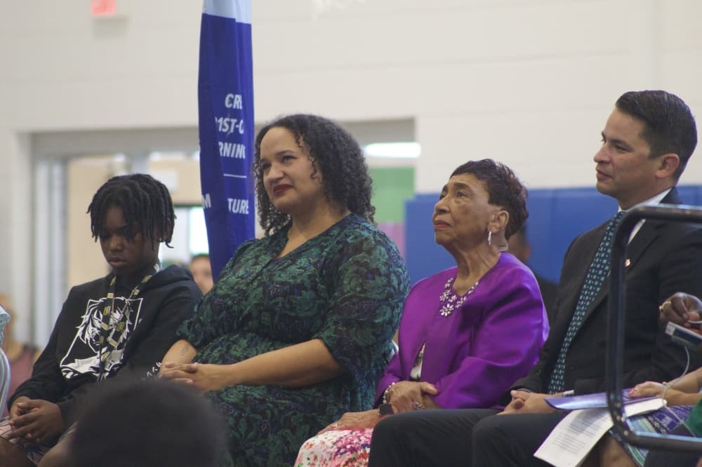 From left to right: A Marshall Middle School student, Marshall Middle Principal Jordan Benson, Marian Lavon Marshall and interim superintendent Matias Segura at the grand opening of Marshall Middle School. (Elle Bent/Community Impact)