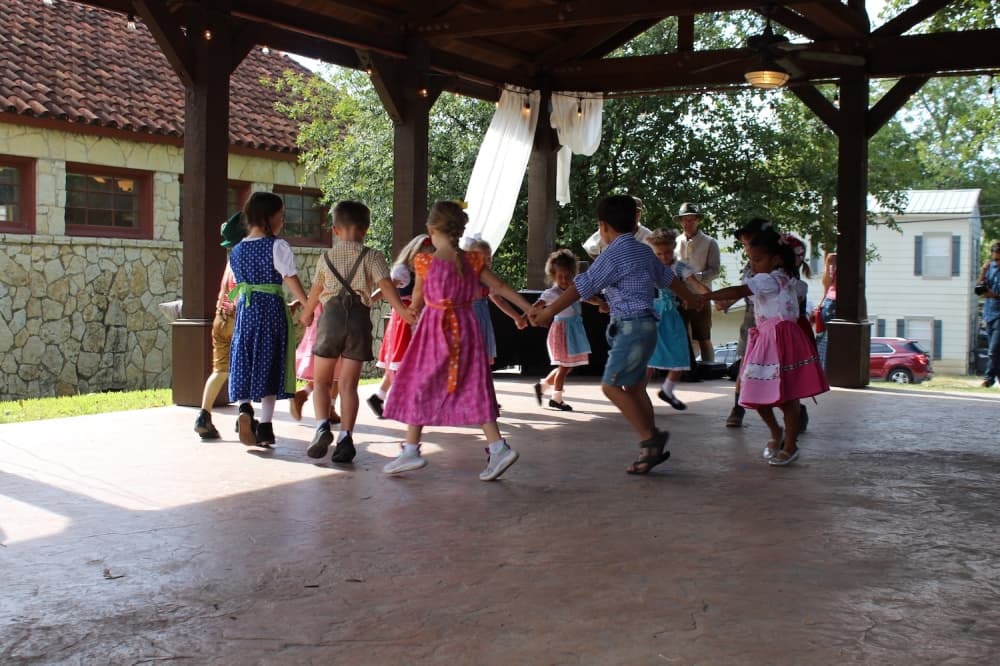 children performing traditional dance