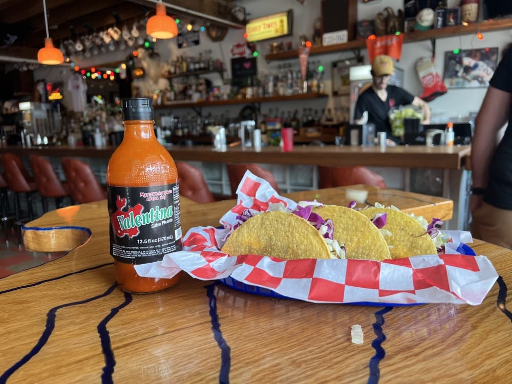 The bar offers some bites, like the crunchy taco trio ($12)