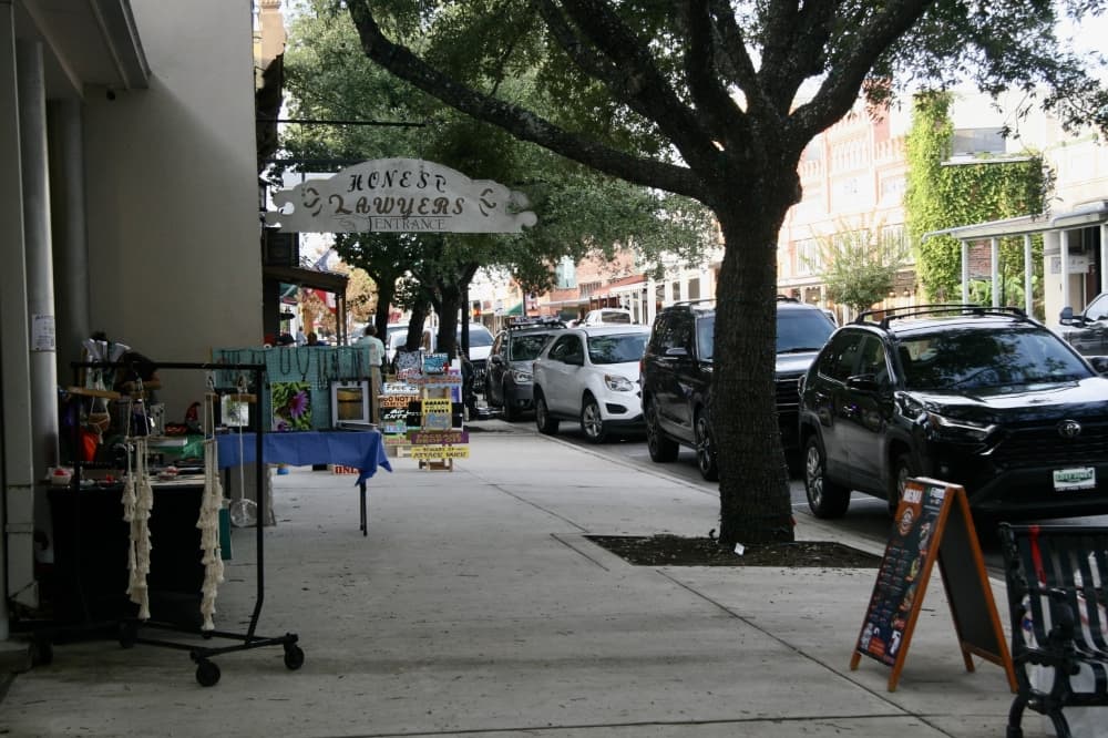 Sellers on the sidewalk downtown Bastrop.