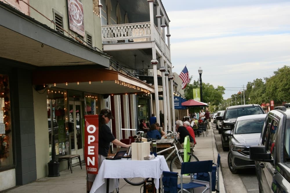 Sellers on the sidewalk downtown Bastrop.