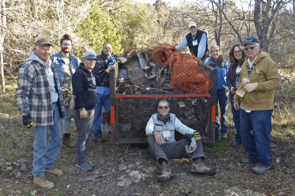 Prospect Park Trail Crew after finishing cleaning up a trash site and reconfiguring a trail marker.