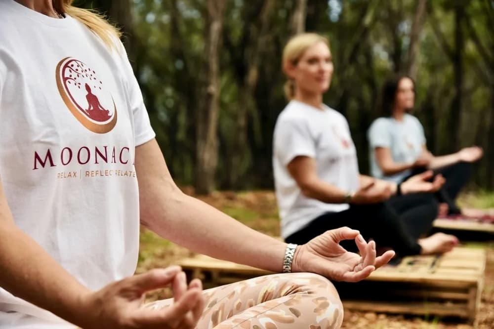 women doing yoga outside