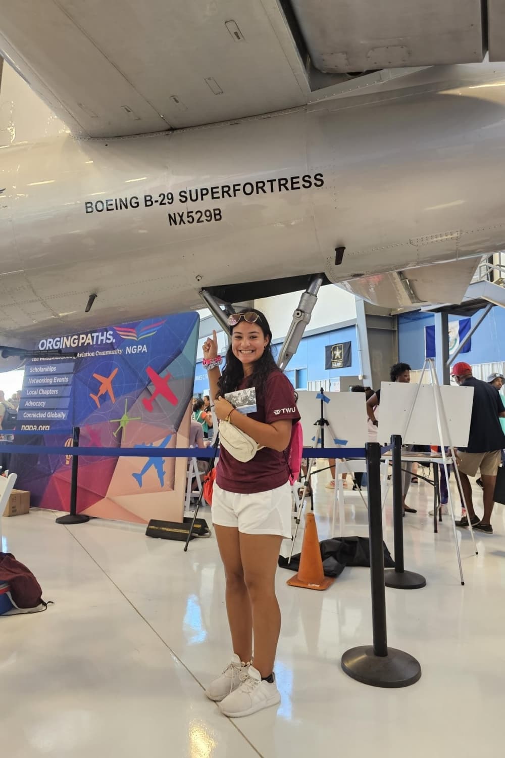 Ava Elder posed with a plane. 