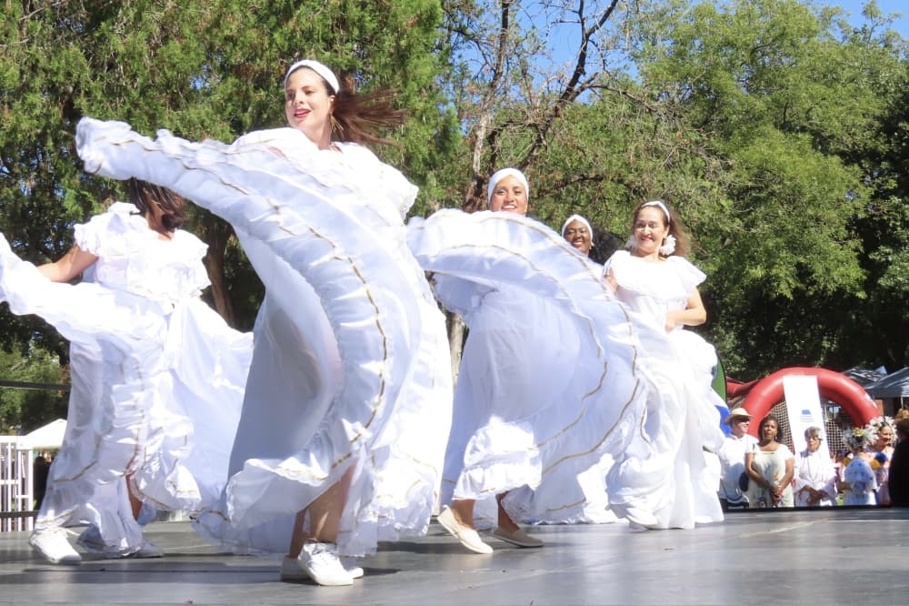 Dancers perform traditional Columbian dance. 