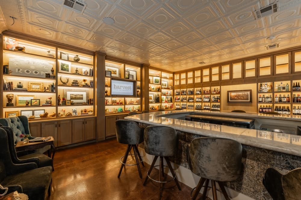 Bar with built-in, lighted shelves