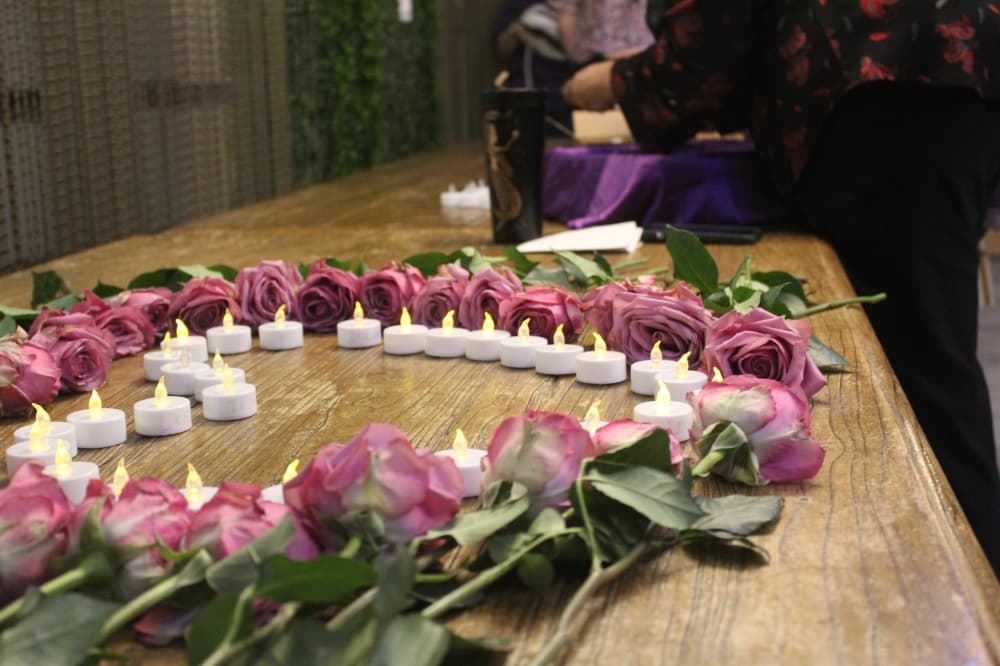 Harris County group hosts candlelight vigil to honor victims, survivors of domestic violence