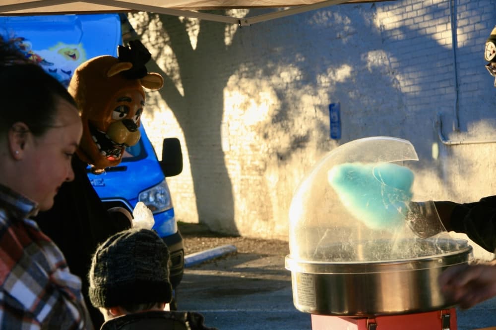Cotton candy being made in a machine.