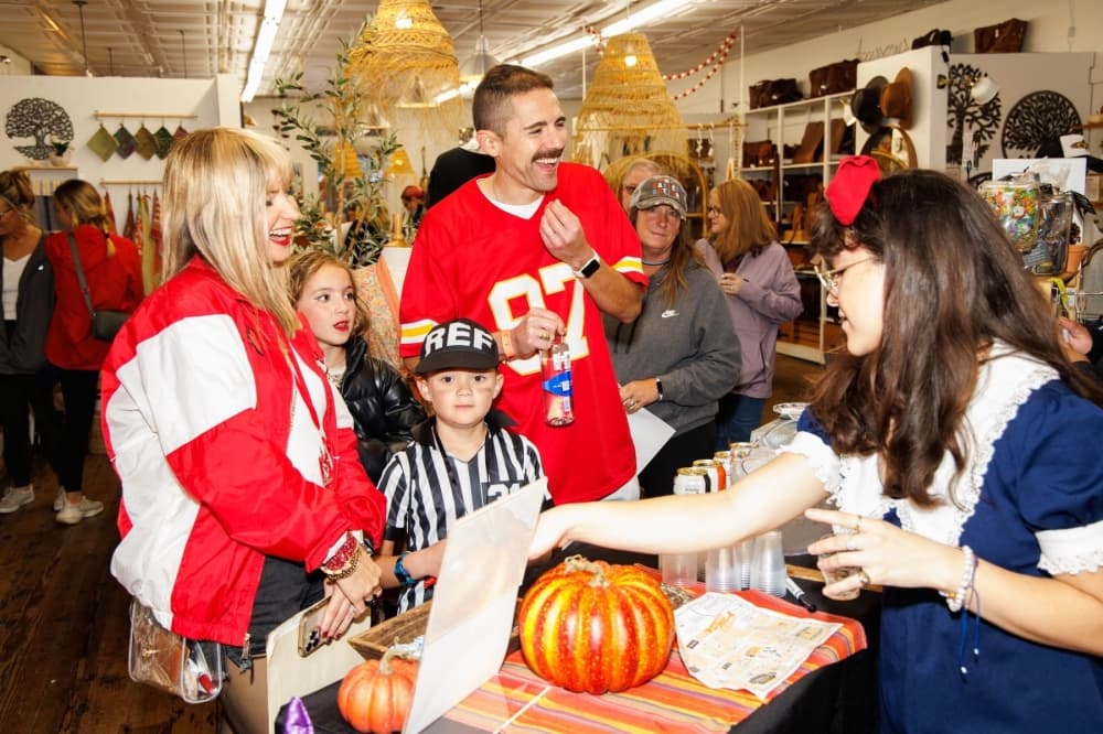 People in costumes drinking beer
