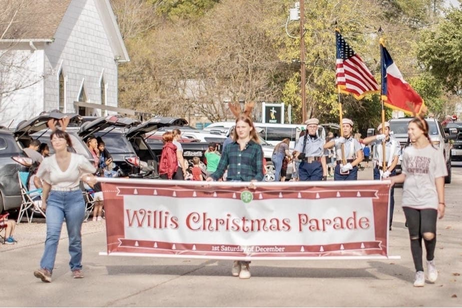 Parade with flags and sign