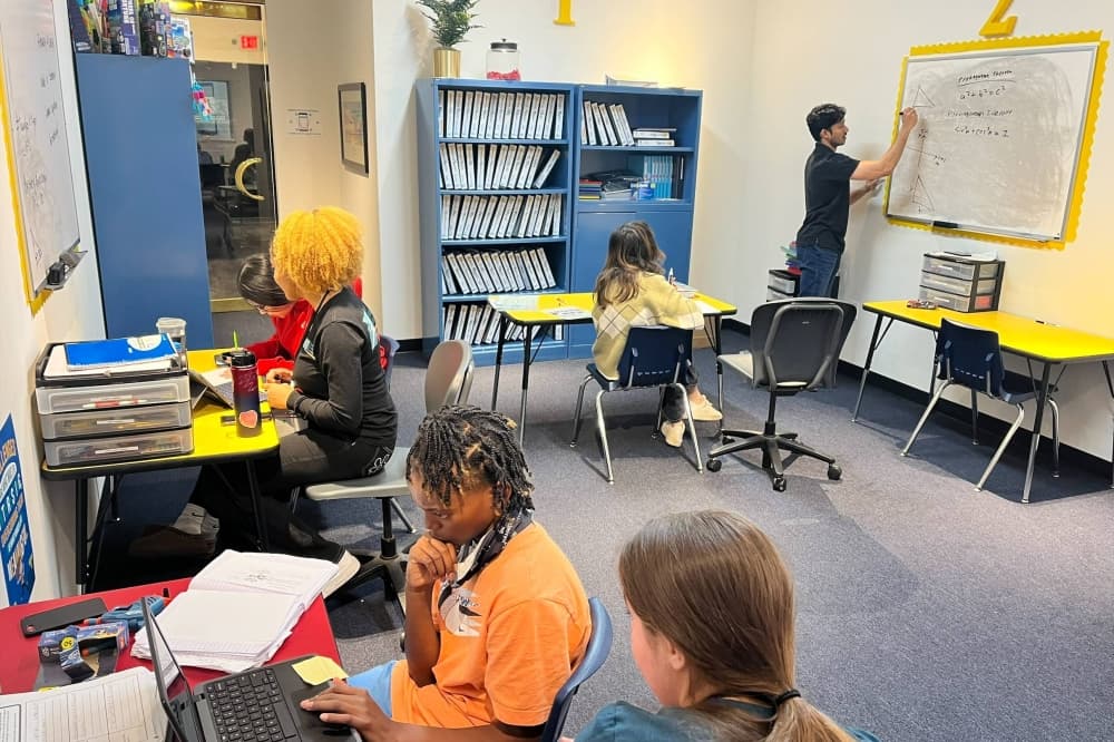 Instructors working with students. 