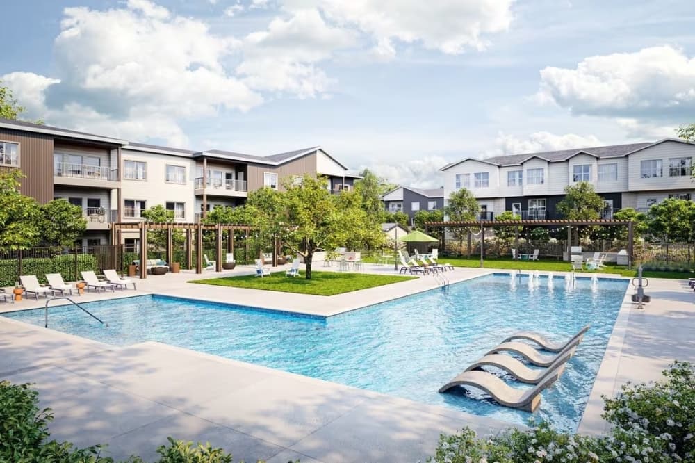 Rendering of River Junction pool area with apartment buildings