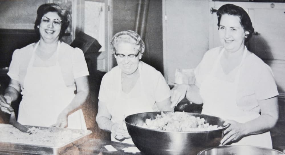 Helen Alcala preparing lunch at Buda High School