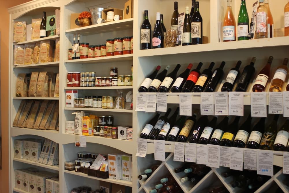 wine and pasta on shelves 