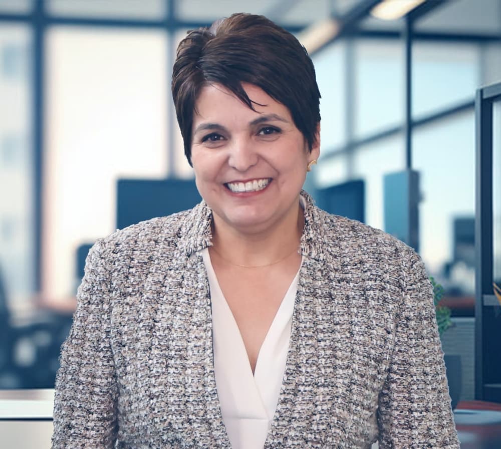 The photo shows a headshot of Virginia Fraire, the president of Lone Star College-University Park.