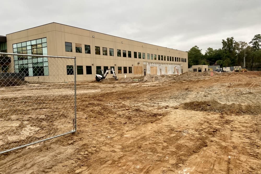 a dirt pile next to the current lone star family health center building 