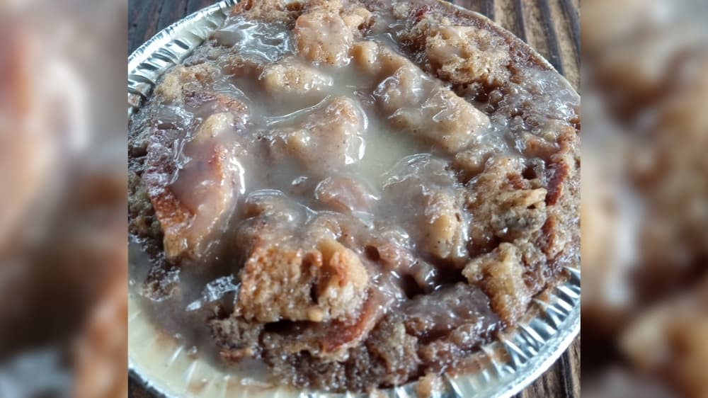 A bread pudding pie is shown in a pie tin.
