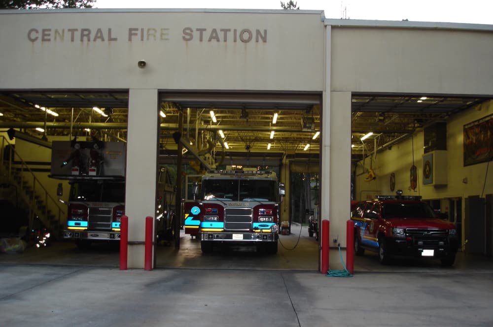 Firetrucks in bays at the fire station