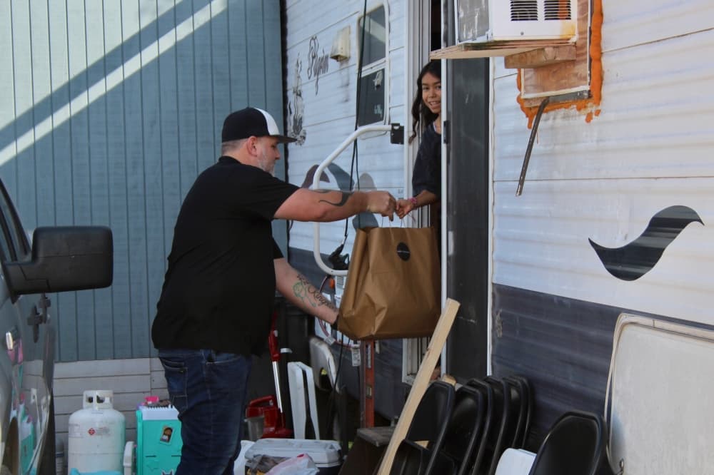 Mike Dahlhauser delivering groceries 