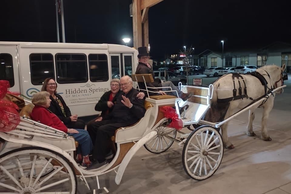 Hidden Springs of McKinney residents in a horse-drawn carriage
