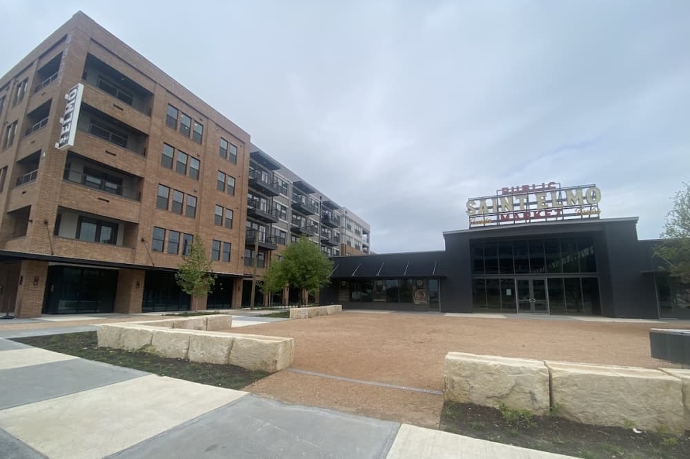 St. Elmo apartments and St. Elmo Public Market side-by-side.