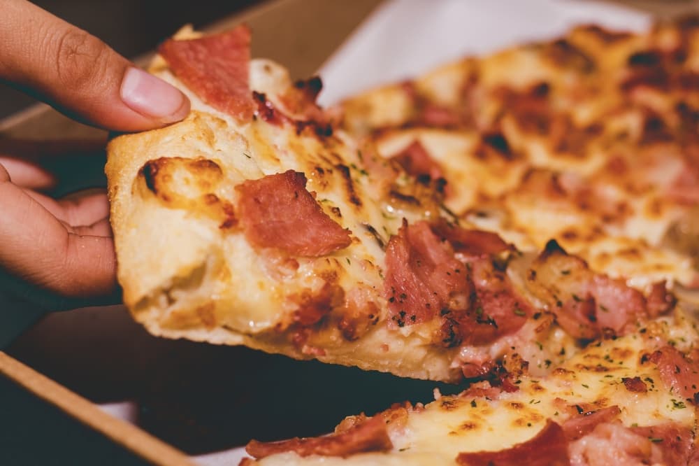 Domino’s franchise opens 100th store in Rosharon