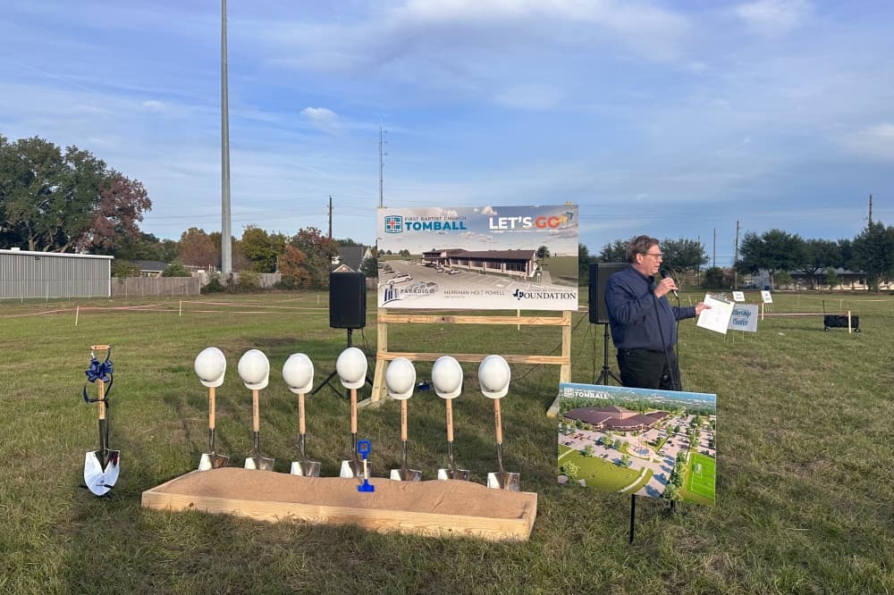 James Clark stands and speaks during a groundbreaking ceremony