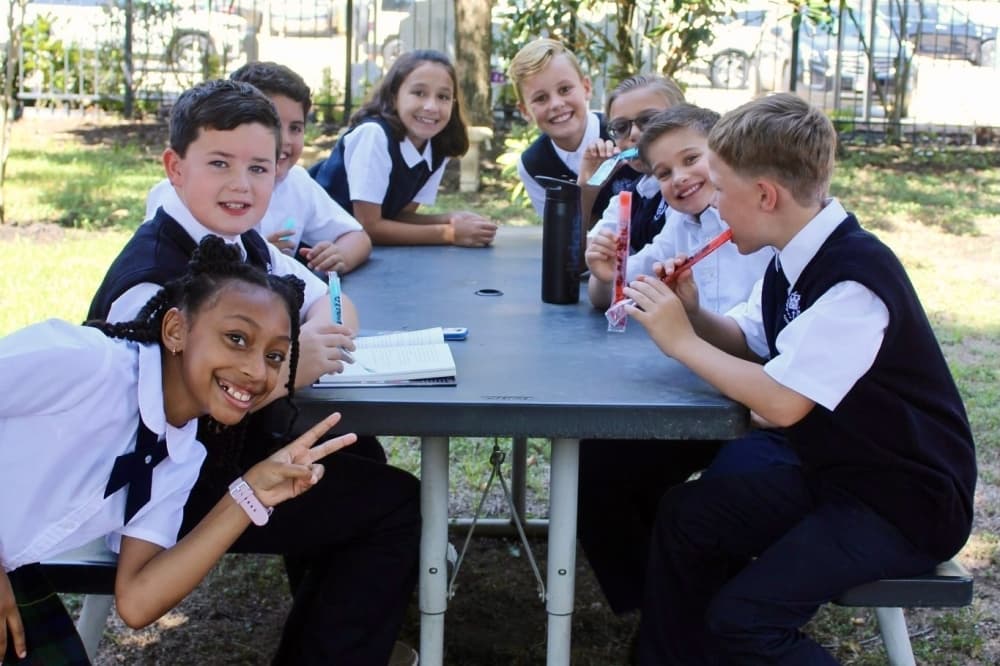 Students at St. Anne Catholic School in Tomball celebrate the first day of school for the 2023-24 school year. 