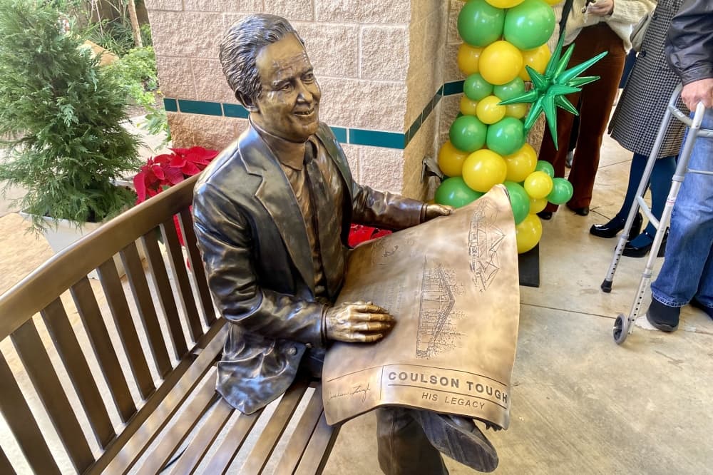 The sculpture of Coulson Tough includes an interactive blueprint that depicts major projects he worked on during his lifetime.