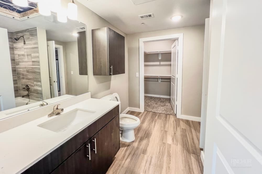 The photo shows a bathroom inside the Aria at Ella