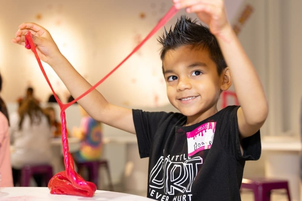 kids plays with slime
